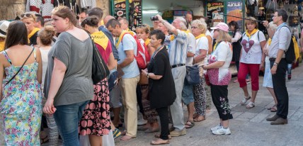 Via Dolorosa pilgrims with selfie gear